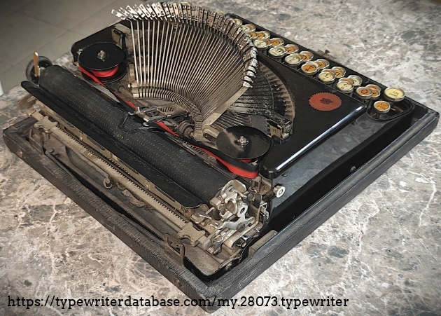 Left rear quadrant view, with typebars extended.