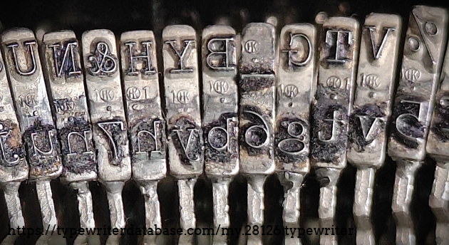 Type slug detail, showing pica foundry marks.