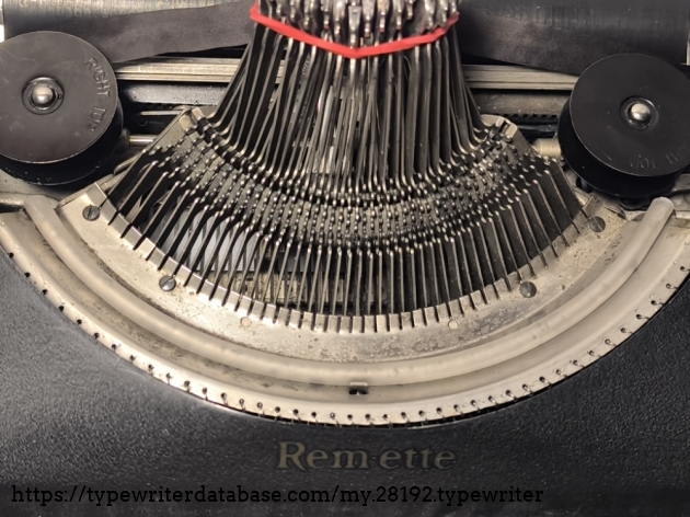 New typebar support made from a rubber hose