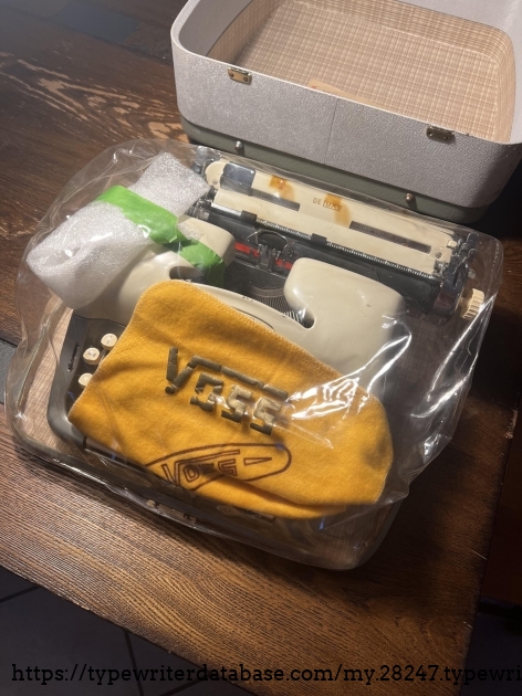 I asked them to protect the carriage arm which they did.  The clear plastic cover is Voss labeled and original.
