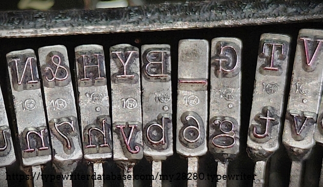 Type slug close up.  The foundry markings indicate pica typeface, which is what it is.