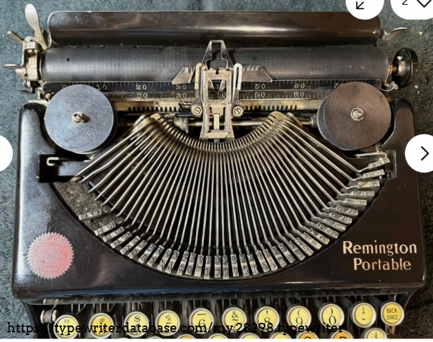Carriage and type basket, top-down view.