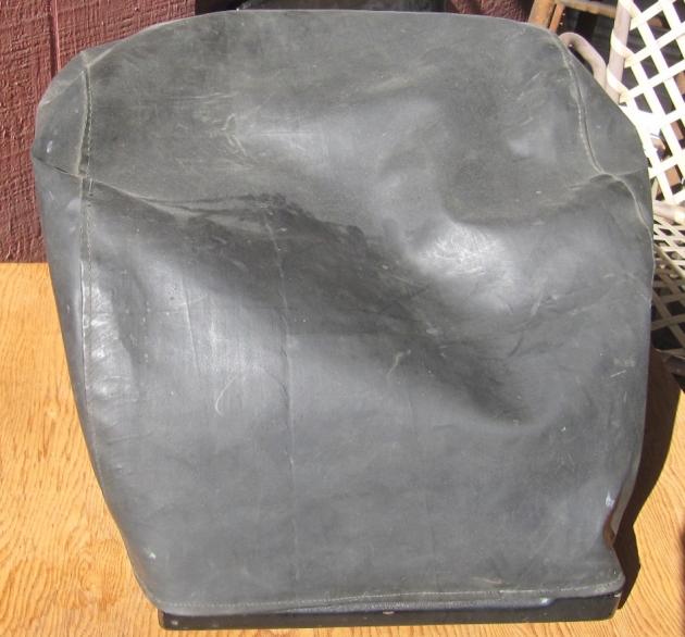 The seller on eBay said it came with this 'genuine leather cover". 
Genuine leather means rubberized fabric.
He didn't know anything about typewriters, and apparently the only leather he's ever worked with was polyurethane.