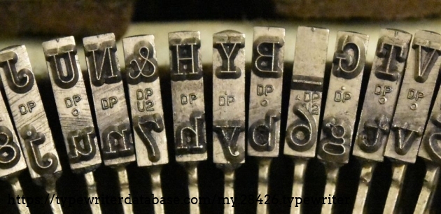 DP for Distinctive Pica, which is what I keep seeing on Underwood Portables.