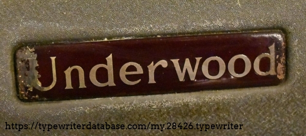 Note the weird degradation of the plastic badge.