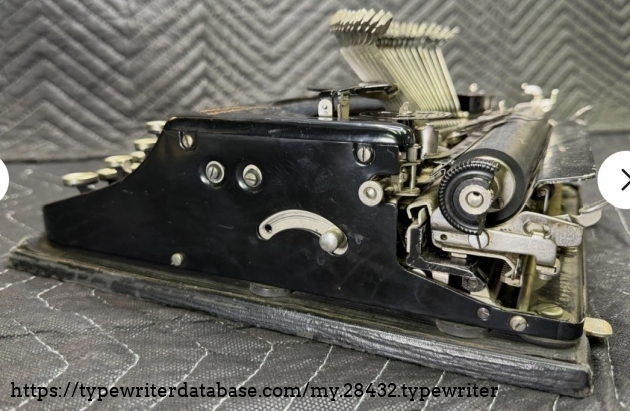 Oblique aft right, typebars extended.