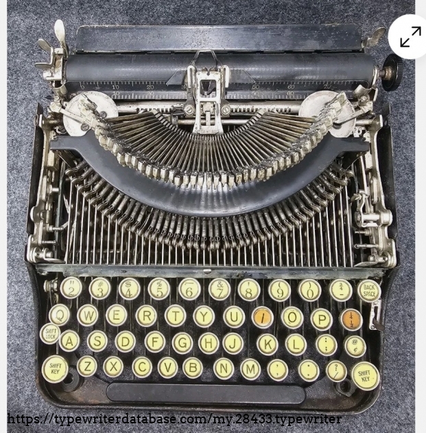 Top front view with top cover removed, and typebars extended.