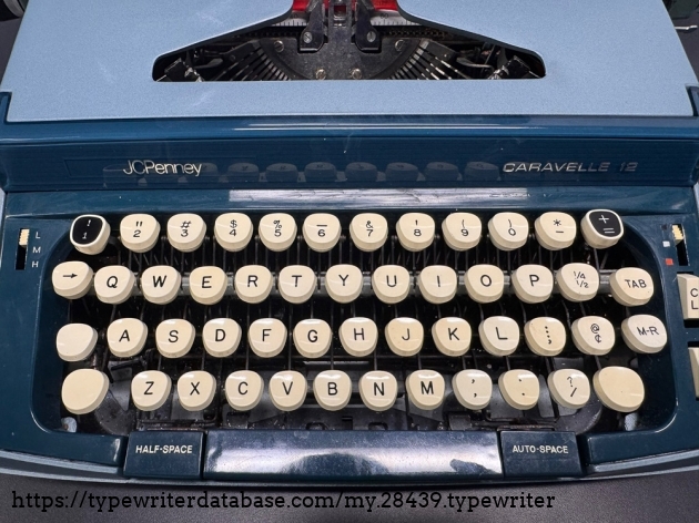 keyboard closeup and  metal ribbon cover logo
