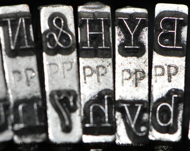 Marked PP.  I am assuming this stands for Portable Pica.  The later portables usually have either DP or UP codes.