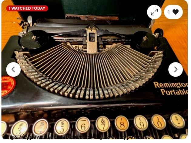 Front view of type basket, ribbon vibrator, and carriage, typebars retracted.