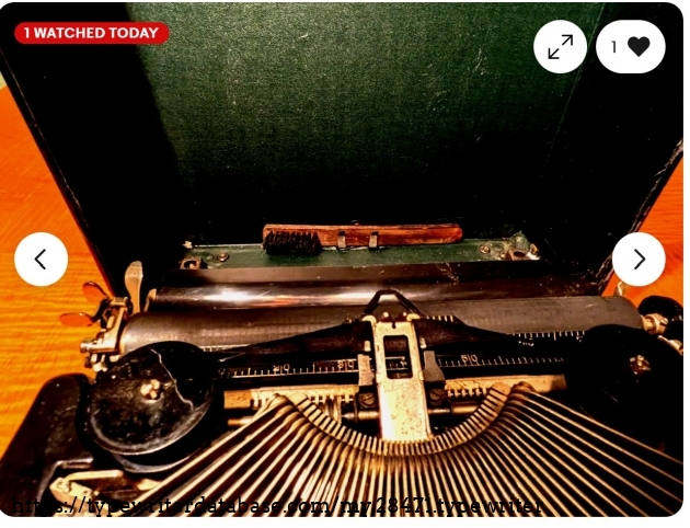 Front top view, showing case top and cleaning brush stowed away.