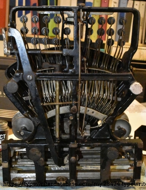 Note the replacement foot composed of stacked felt furniture feet.  Looking at other people's examples, these were affixed to their case bases with metal hooks that bolted to the base.