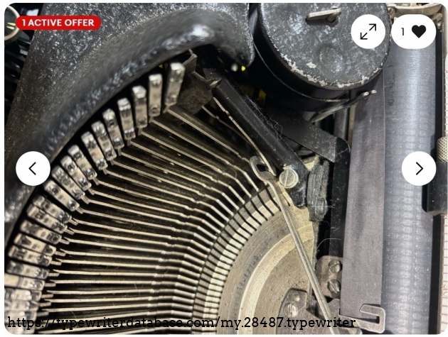 Type basket with key lever extended.