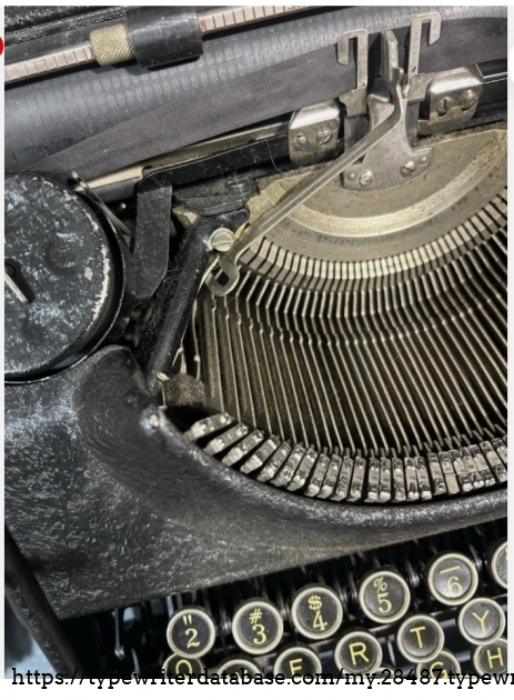 Typebar at printing point.