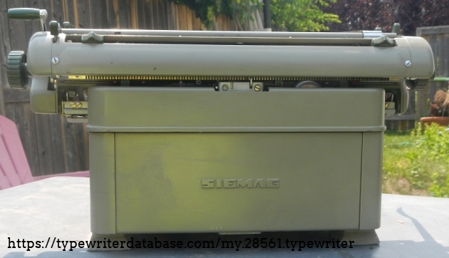The back.  I believe the back logo was painted-over from the factory.
