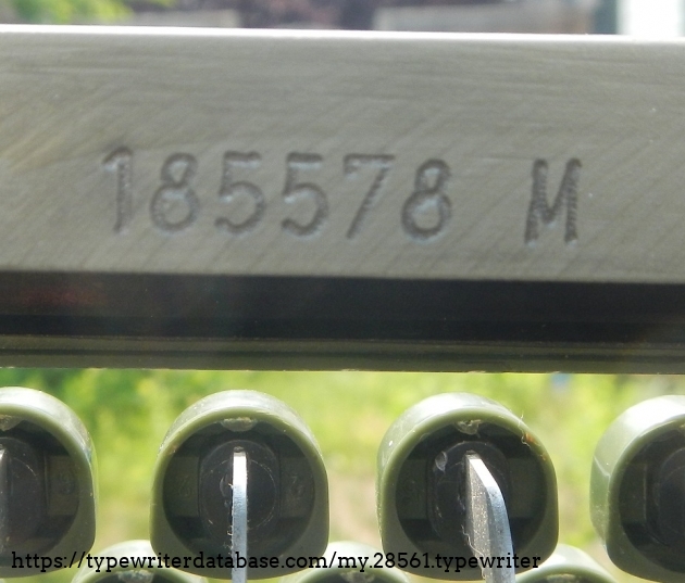 The "other" serial number, from the frame near the space bar.