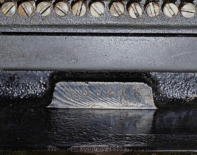 Serial number on the underside at back of the machine.