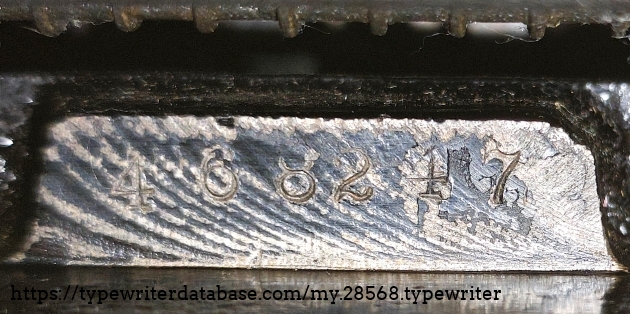 Closeup of the back-underside serial number.
