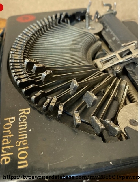 Right type basket detail with some keys partially lifted.  Maybe the seller doesn't know about the typebar lift lever.