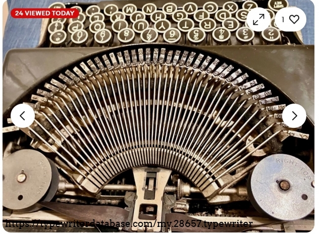 Type basket and keyboard, top-down from behind the machine.
