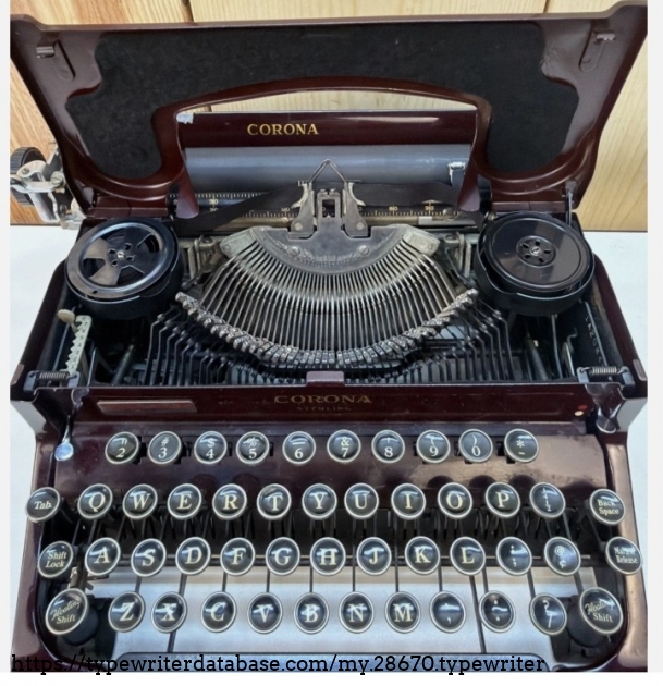 Front with ribbon cover raised.