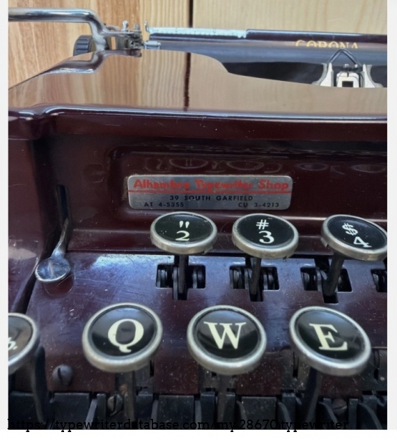 Alhambra Typewriter Store badge.