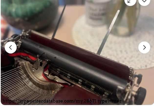 Carriage with paper supports extended.