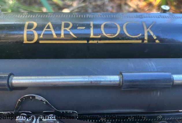 Newly replaced rubber rollers on paper bail. Paper table logo is in fairly good condition for almost 100 years old!