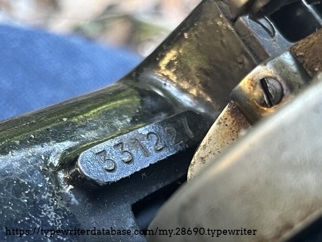 Serial number stamped on body.