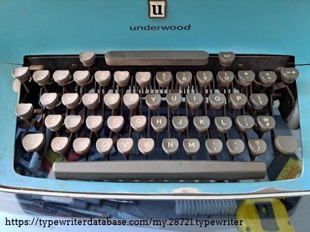 I thought the keys were heavily oxidized, but it turned out they were just extremely dusty, and a damp cloth and a little scrubbing got them cleaned up quickly.