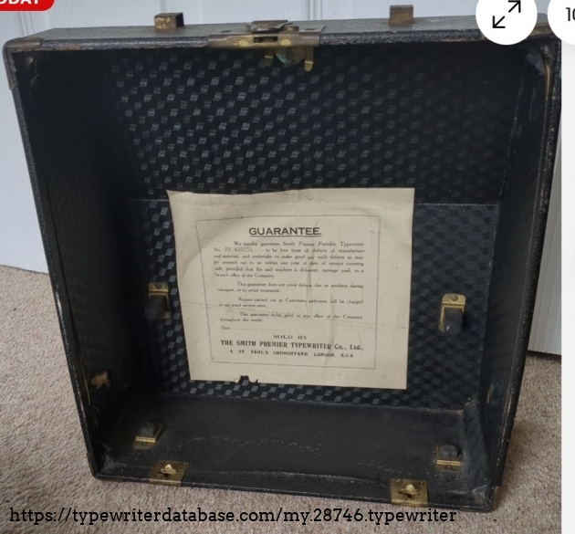 Case top, underside, showing Guarantee label.