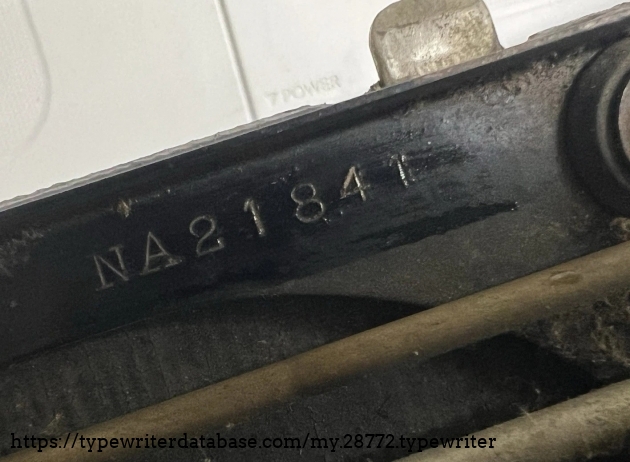 Image of the actual serial number on the body of the machine as provided in the eBay listing.