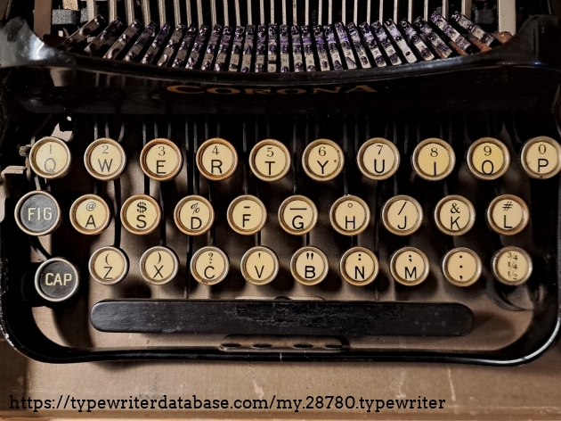 The keyboard. Note the unusual character set. I've not found another Corona 3 with this same set.