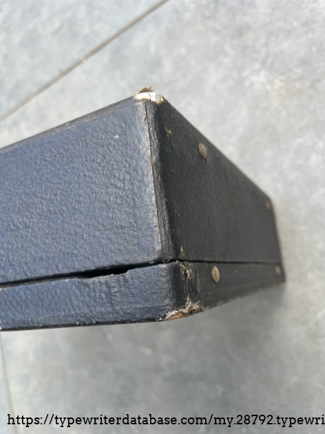 Case: notice where the case is damaged that you can see the aluminum (?) lit and the wooden base of the case.