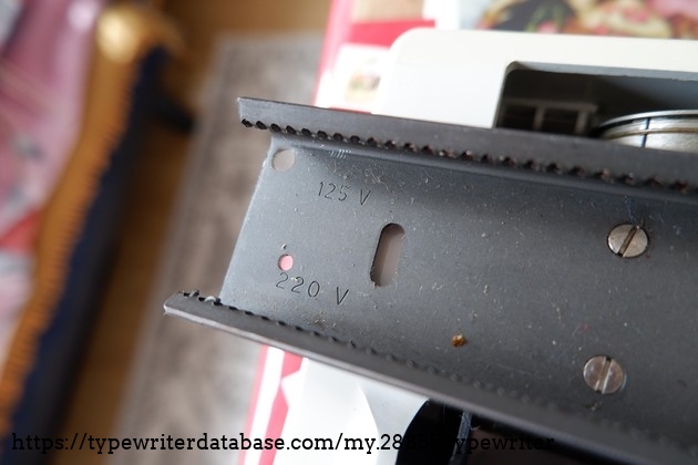 Voltages stamped on the carriage rail, probably shared with electric Hermes models
