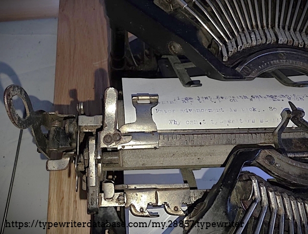 Left carriage end with paper inserted.