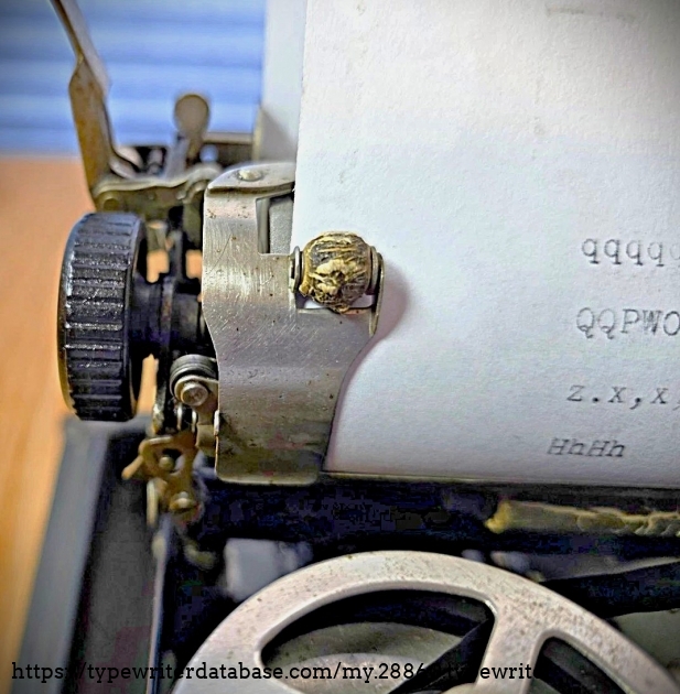 Left carriage end with paper inserted.