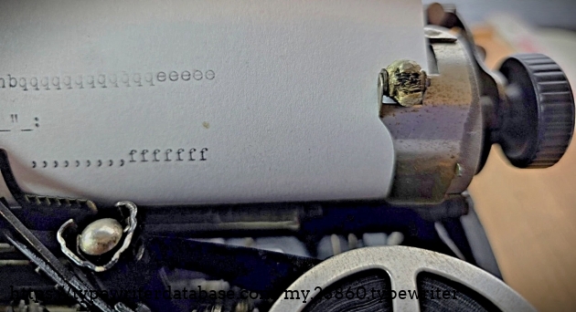 Right carriage end with paper inserted.