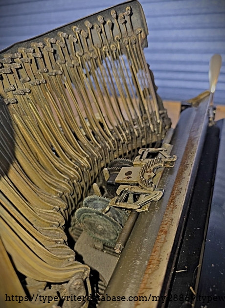 Typebars viewed from the right-side of the machine.