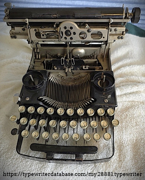 Front view with carriage raised.