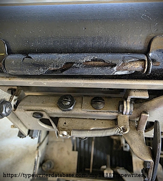 Detail of platen and rollers, showing cracks.