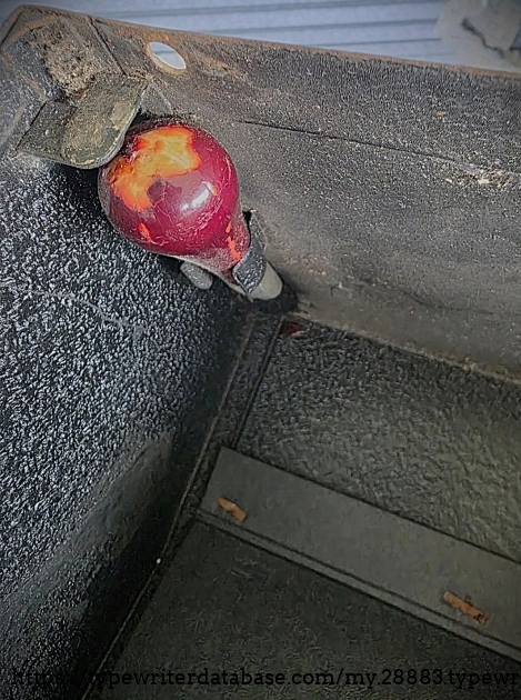 Case inside corner.  Not sure what the red light bulb is all about.
