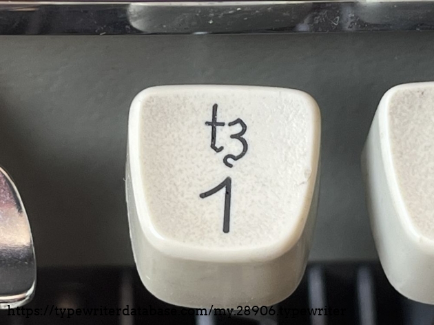 Detail: keytop for "tz" ligature