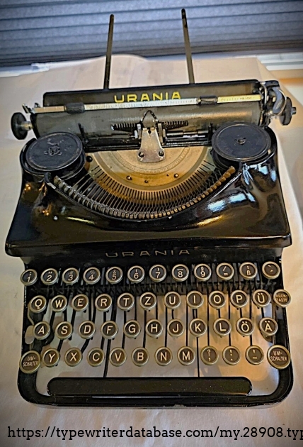 Front with paper fingers extended, and no paper.