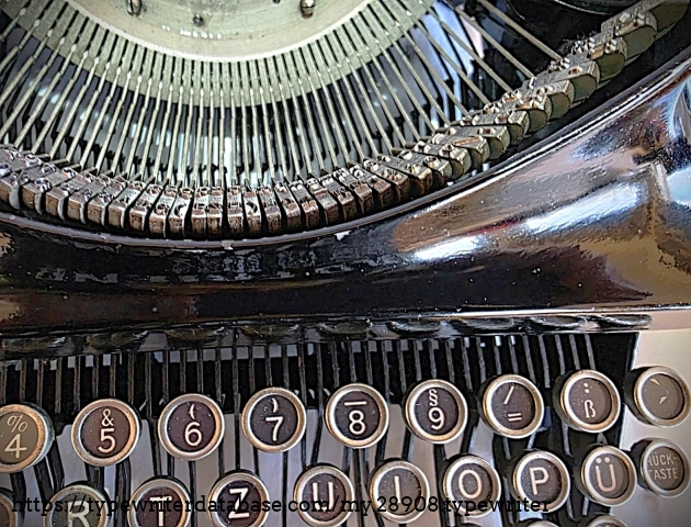 Front closeup - top of keyboard, type basket.