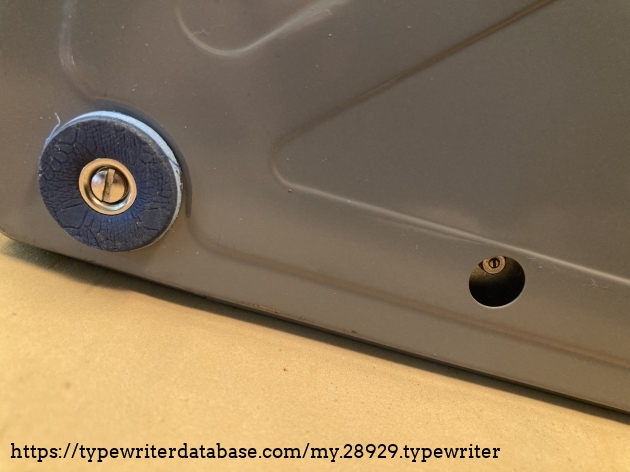 Trip adjuster access. Not easy to do, so just take the cover off.