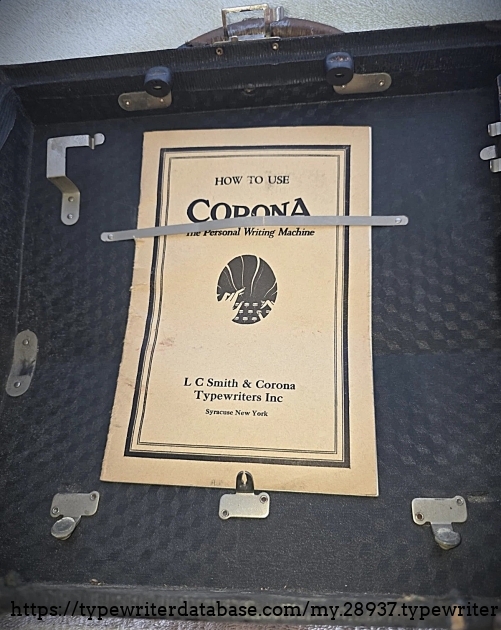 Case top underside, with user manual.