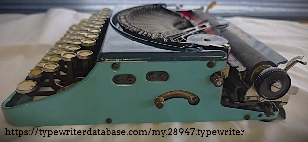 Right broadside, typebars retracted.
