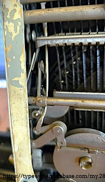 Underside, left-side detail.