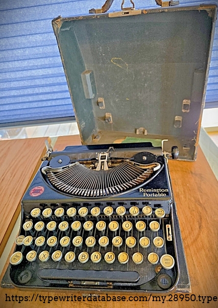 Front, with case, 2nd image.